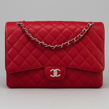 A red caviar "Classic Maxi" handbag by Chanel 2009-2010.