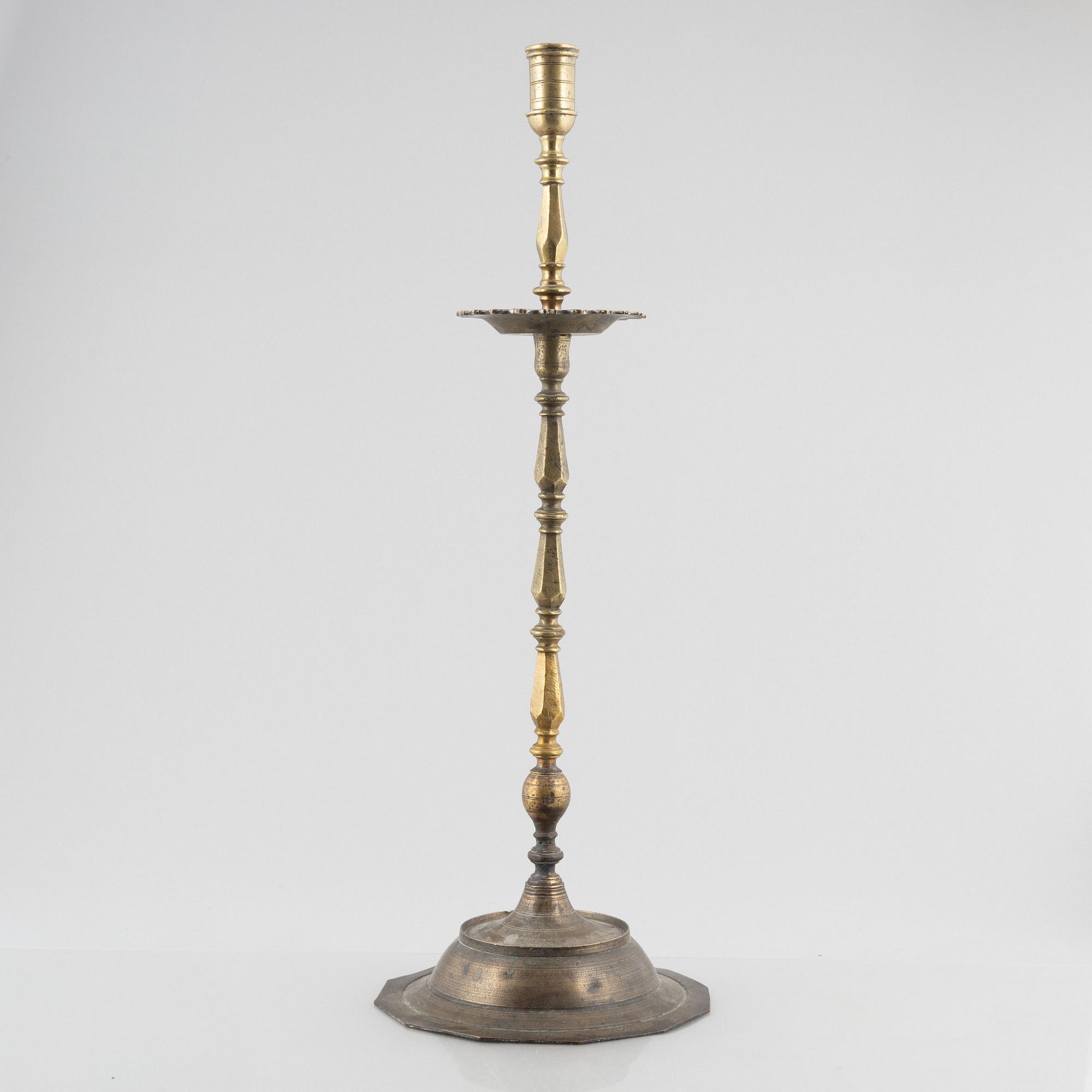 A Baroque-style floor candle stick, around 1900.