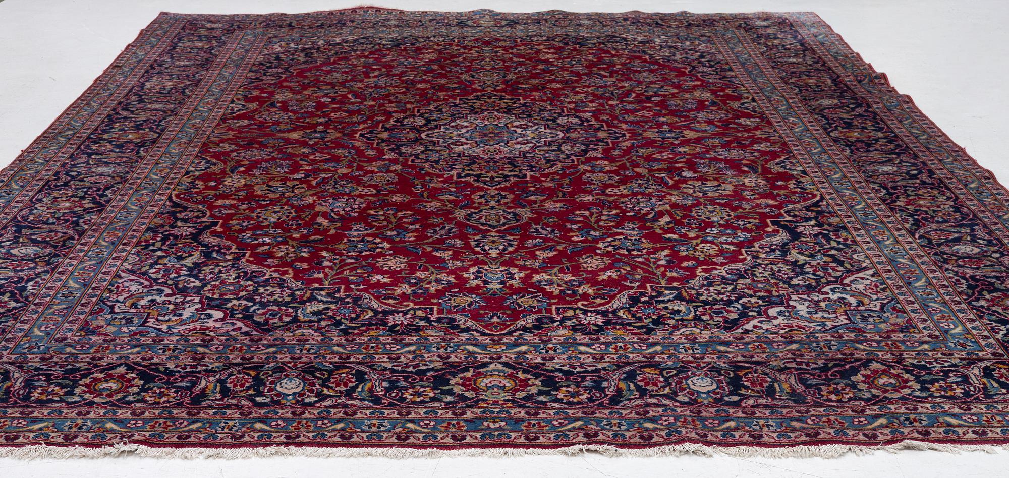 A Keshan carpet, c. 403 x 290 cm.