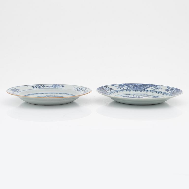 A blue and white serving dish and eight odd plates, Qing dynasty, 18th Century.