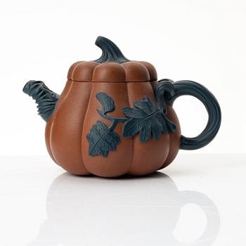 A Chinese yixing 'gourd' teapot, four cups and three saucers, 1980s.