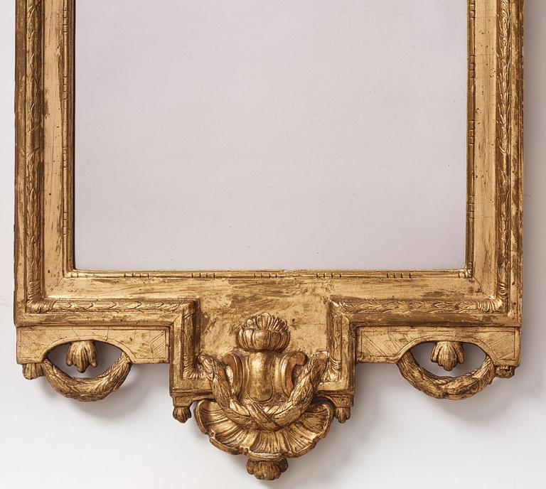 A gitlwood Gustavian mirror by J. Åkerblad (master in Stockholm 1758-99).