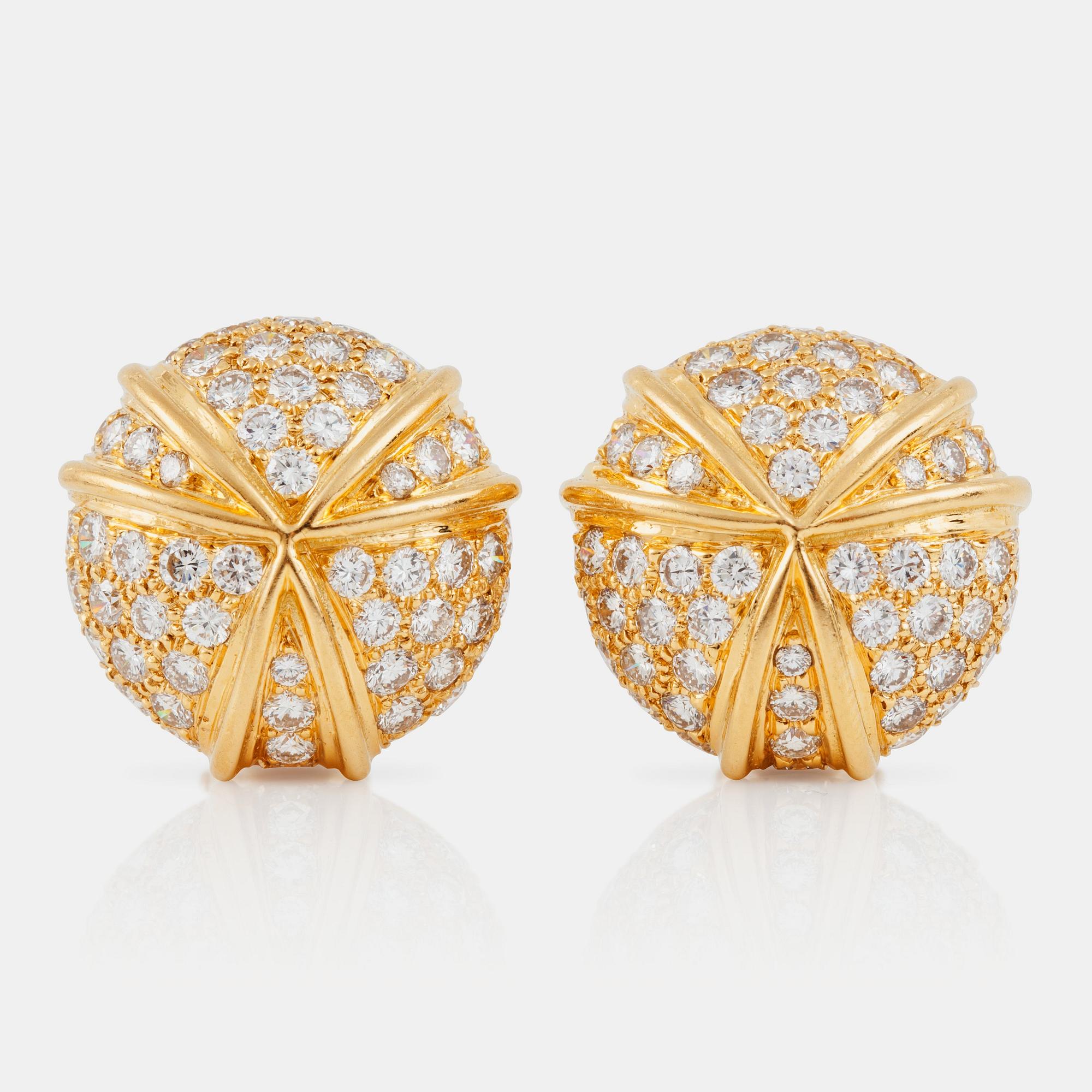 A pair of brilliant-cut diamond earrings. Diamond total carat weight circa 3.50 cts.  Signed Harry Winston.
