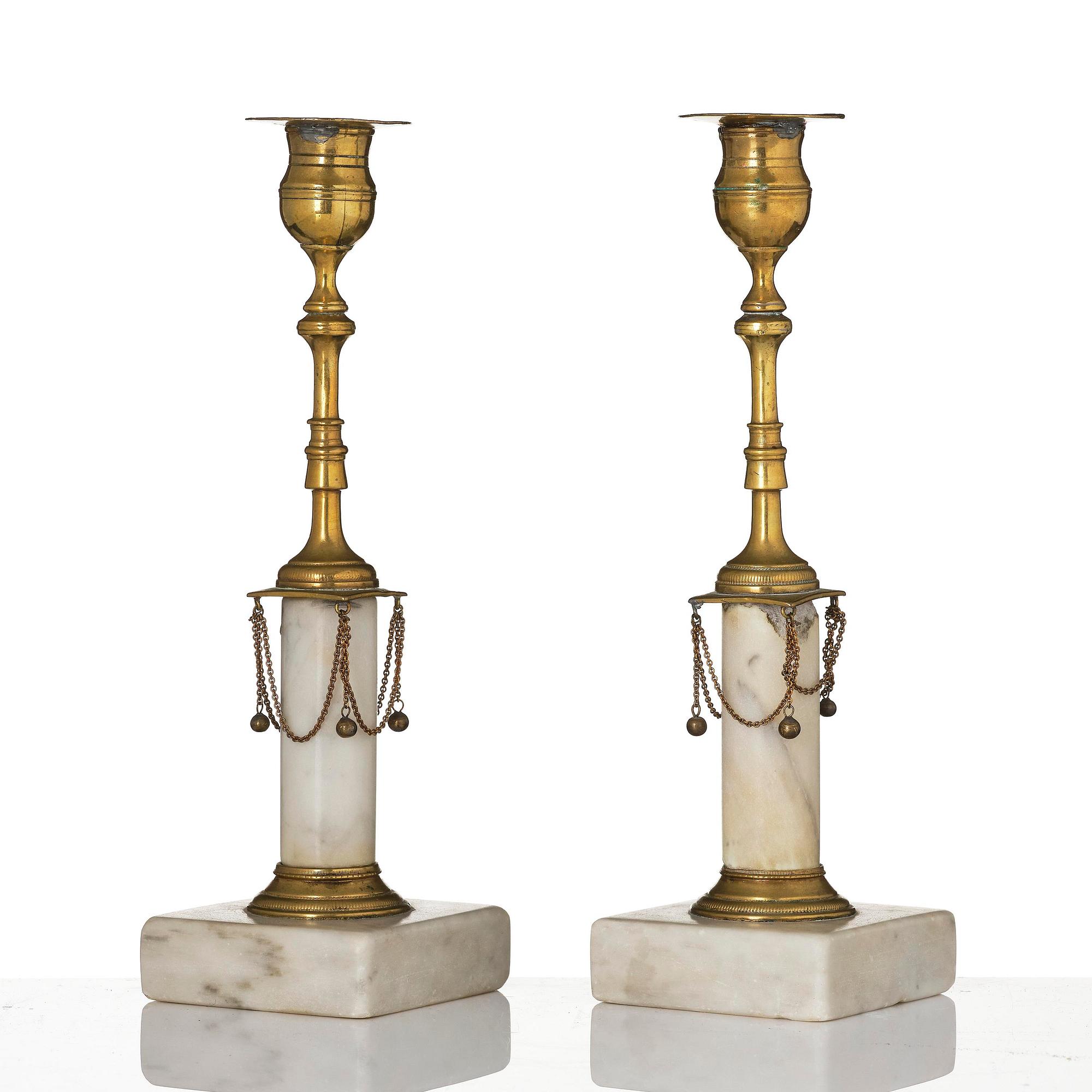 A pair of late Gustavian marble and gilt brass candlesticks, late 18th century.