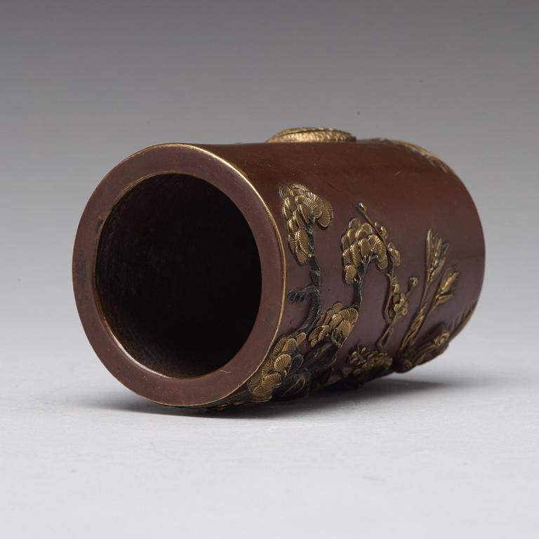 A bronze brush pot, Qing dynasty, with Qianlong seal mark to base.