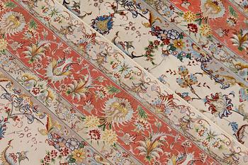 A part silk Tabriz carpet, so called 60 Raj, signed, c 290 x 176 cm.