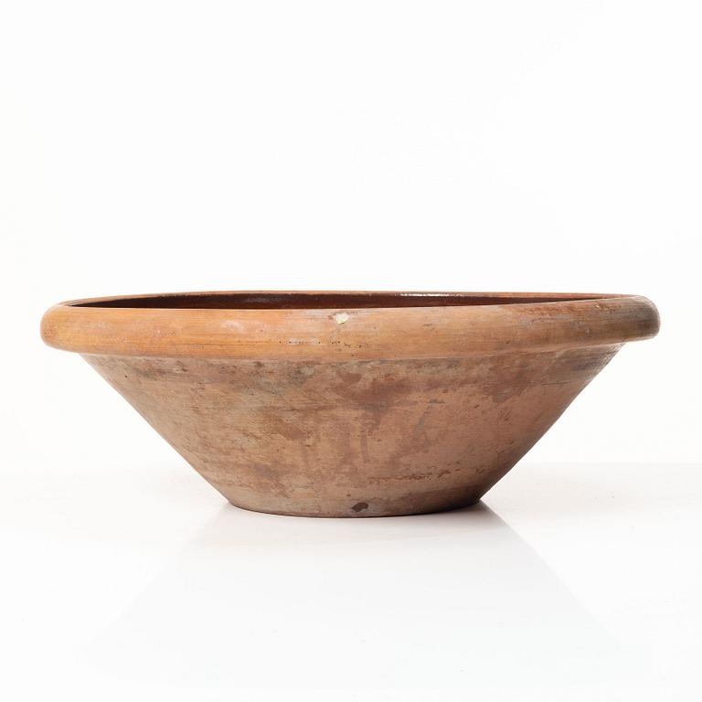 A earthenware dish, circa 1900.
