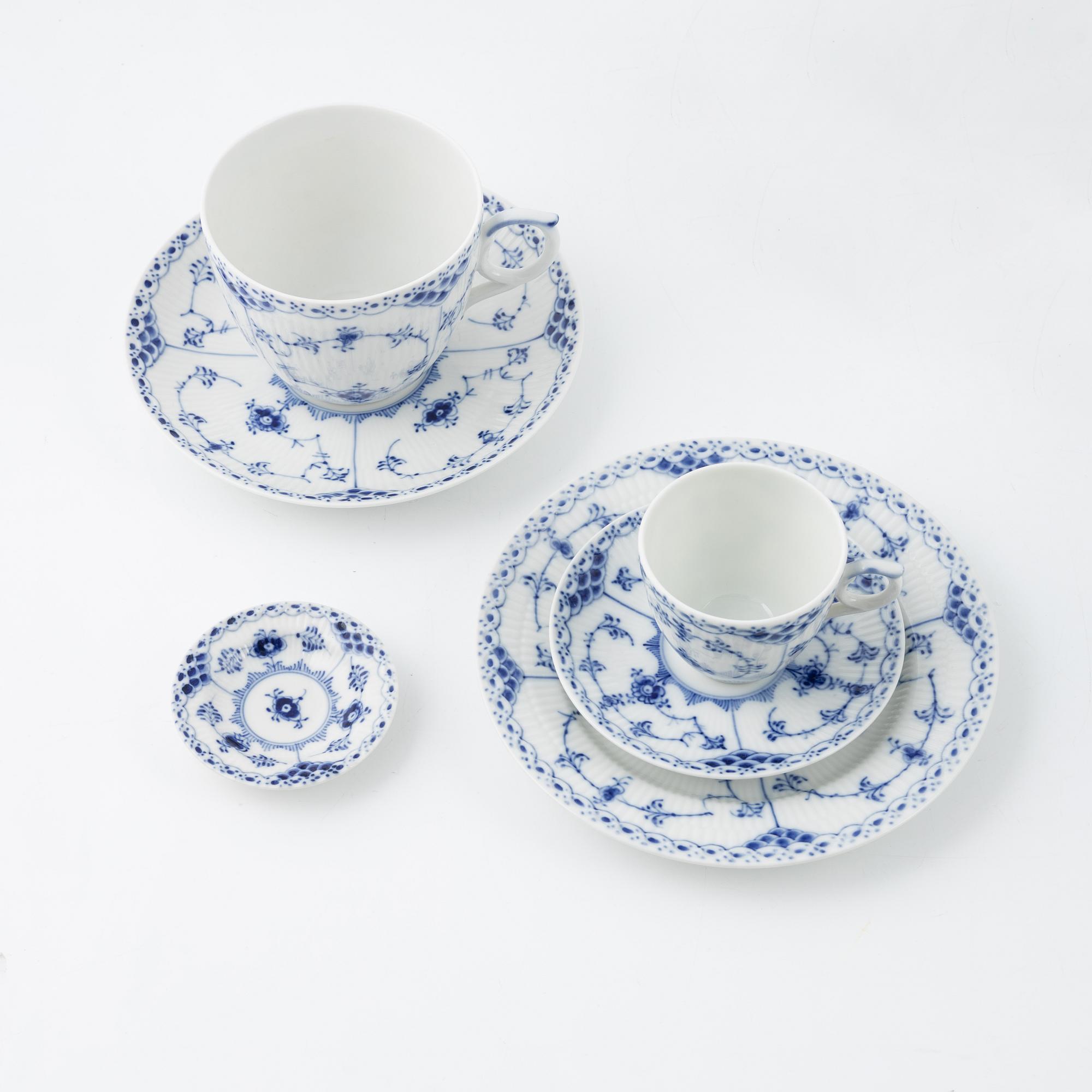 A 48-piece coffee and tea service, half lace and full lace 'Musselmalet', Royal Copenhagen, Denmark.