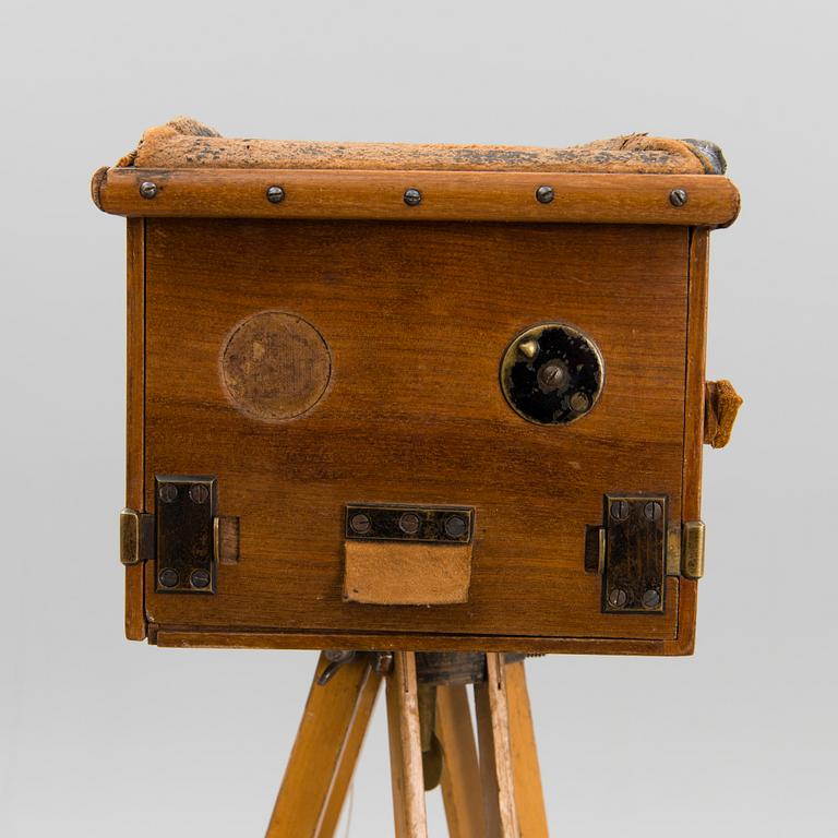 A camera with stand, circa 1900.