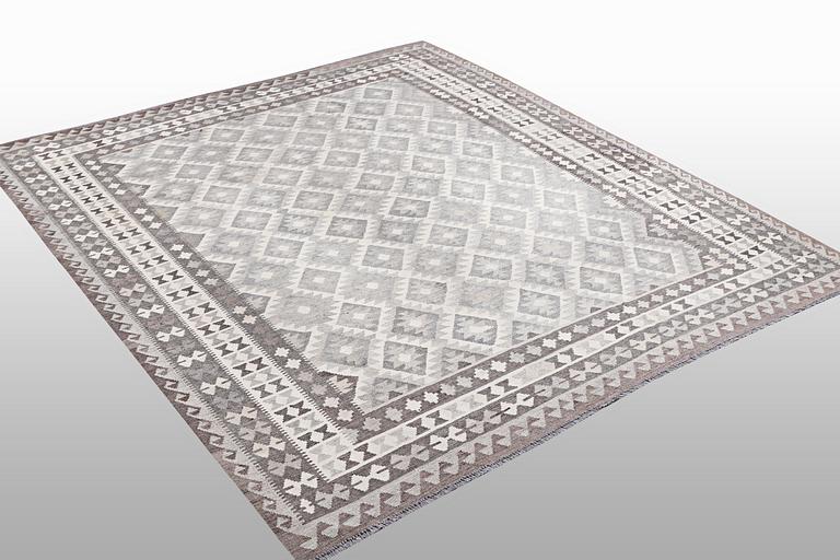 A carpet, Kilim, ca 297 x 257 cm.