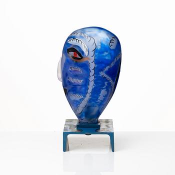 Ulrica Hydman-Vallien, a painted glass and iron sculpture of a face, Sweden.