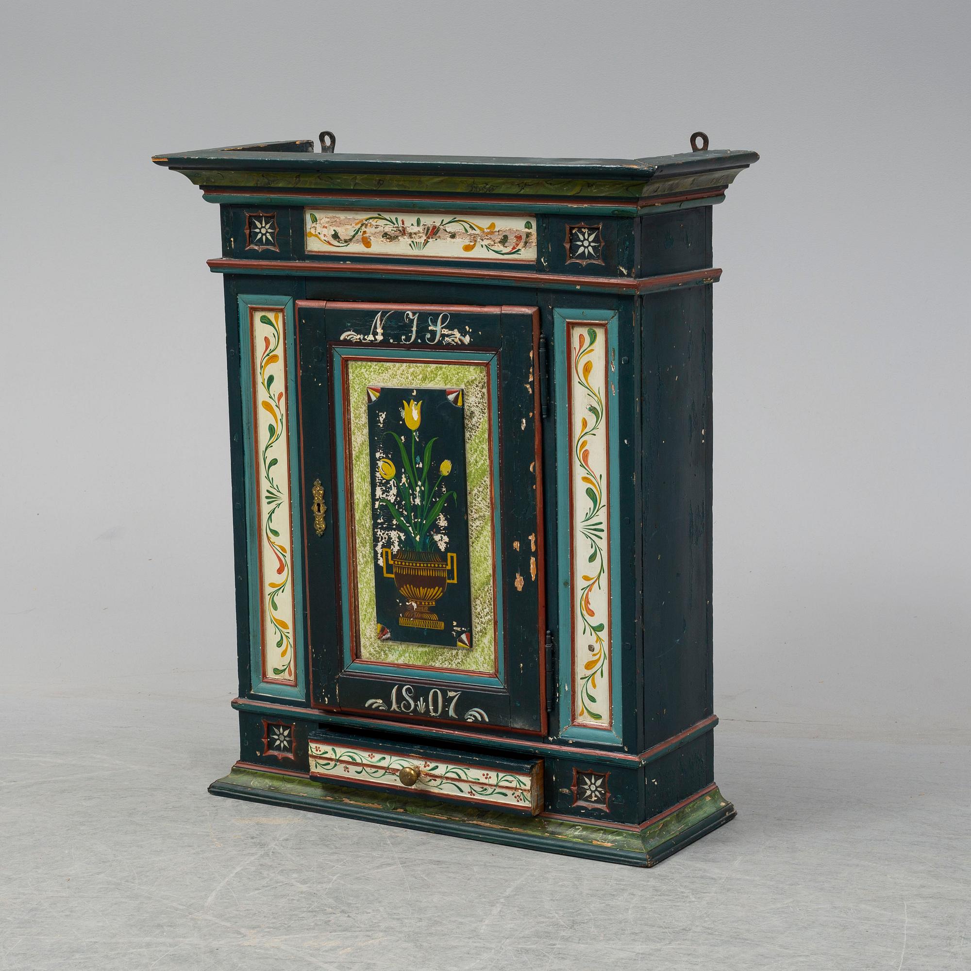 A painted wall cabinet, 19th century.