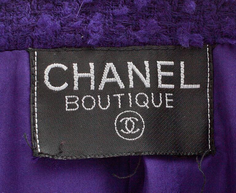 A two-piece Chanel suit, autumn 1993.