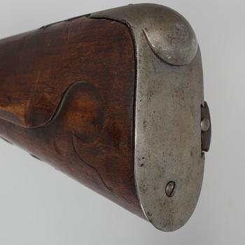 A 18th century flintlock rifle.