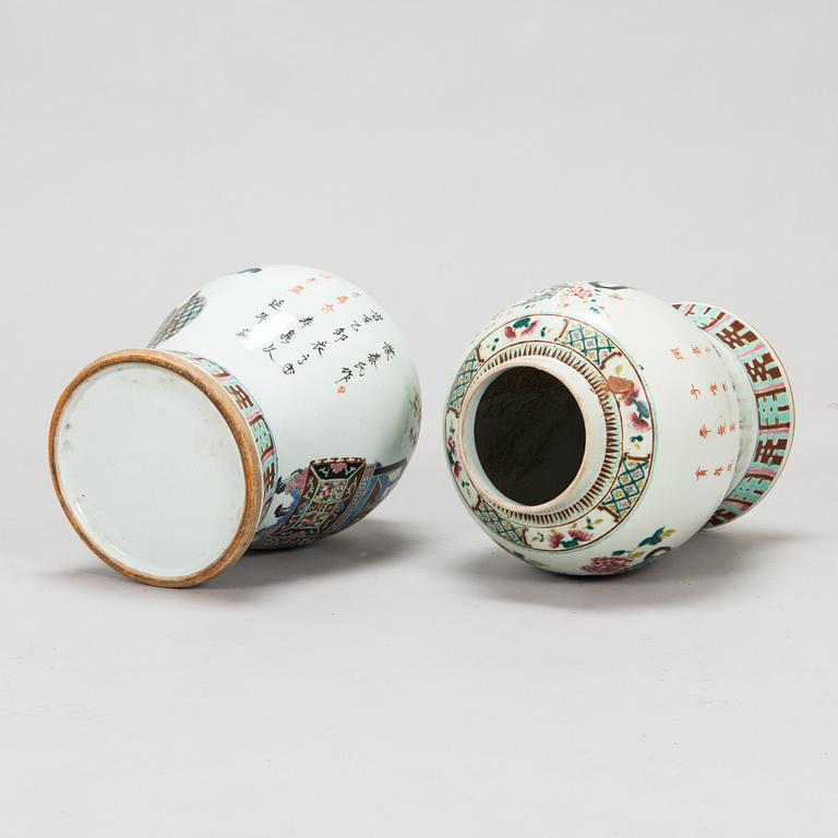 A pair of famille rose jars with covers, China, early 20th Century.