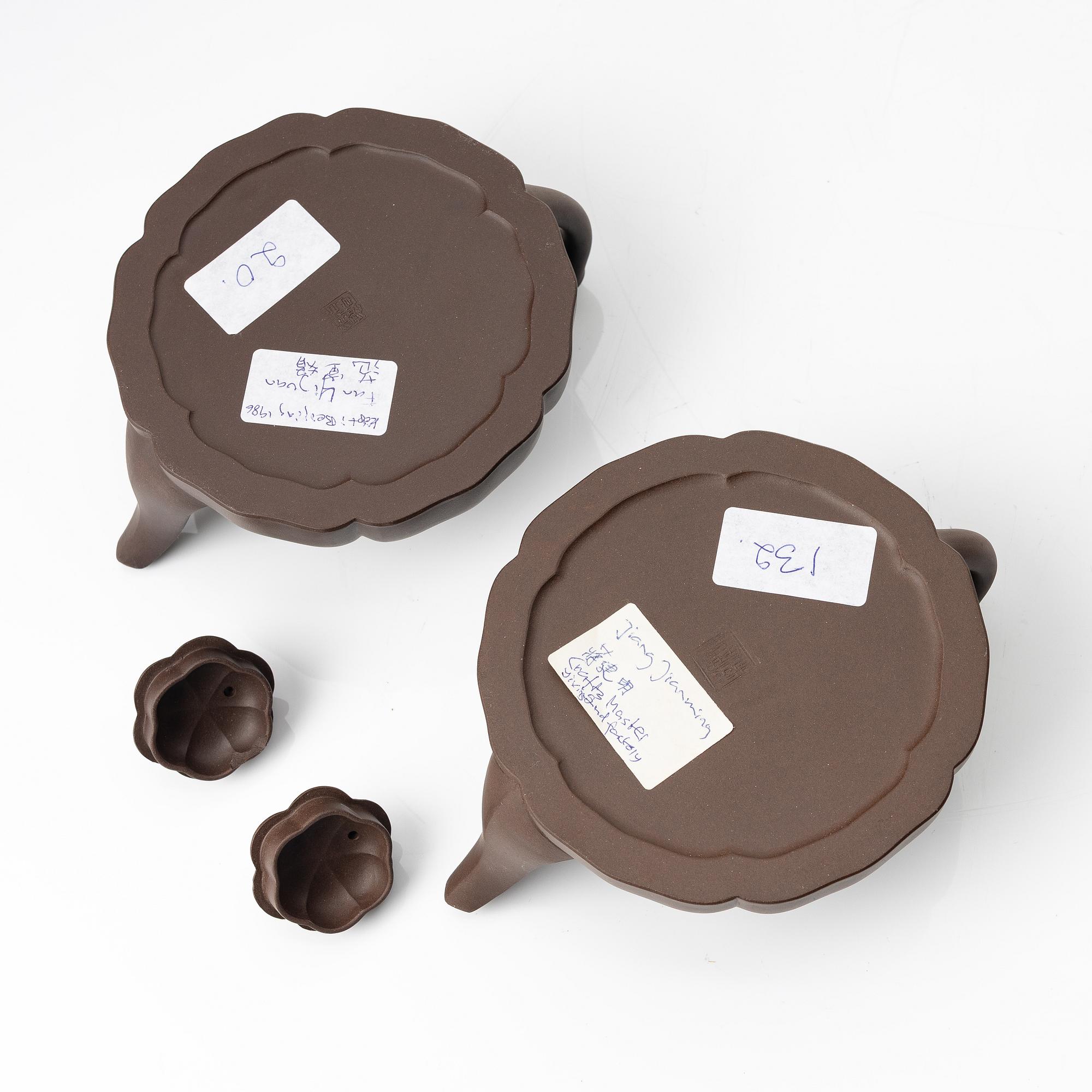 Two similar 'magnolia flower six-petal' yixing teapots, China, 1980s.
