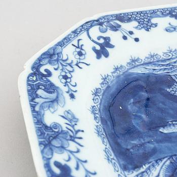 A set of two blue and white serving dishes, and two famille rose dinner plates, Qing dynasty, Qianlong (1736-95).