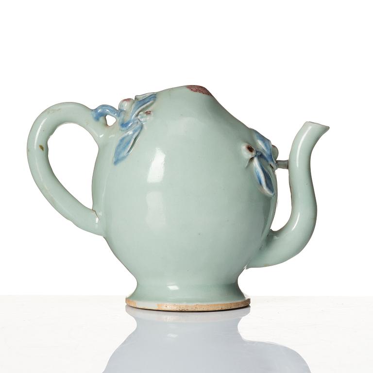 A celadon and underglaze blue and red glazed Cadogan tea pot, Qing dynasty, 19th Century.
