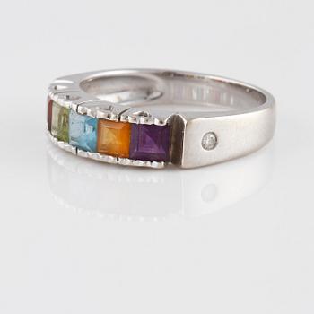 RING, 18K guld med med fem fasettslipade olikfärgade stenar samt 2 briljantslipade diamanter. Vikt 4,1 gram.