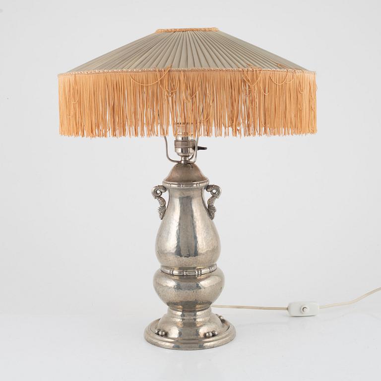 A pewter table lamp, first half of the 20th Century.