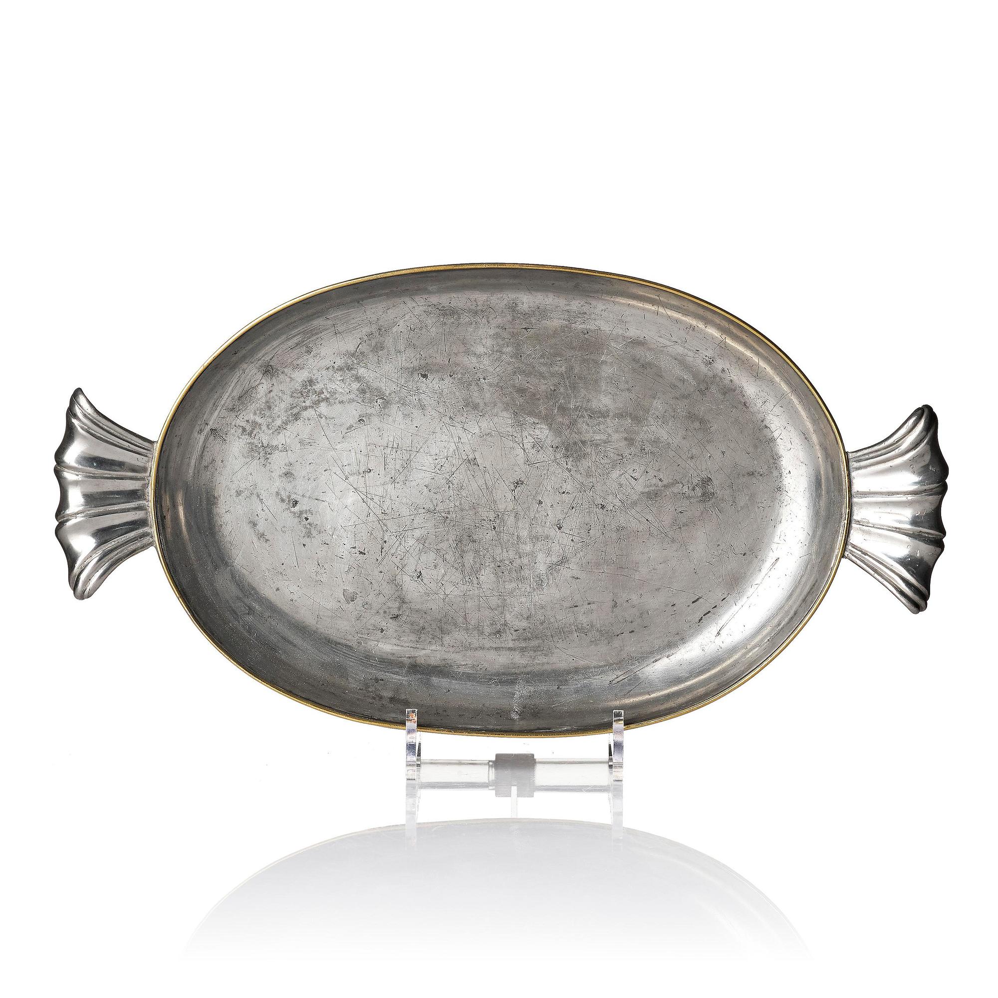 Firma Svenskt Tenn, a pewter and brass bowl, Stockholm, 1925.