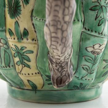 A set of three differently decorated tea pots with covers, Qing dynasty, 18century and 20th century.