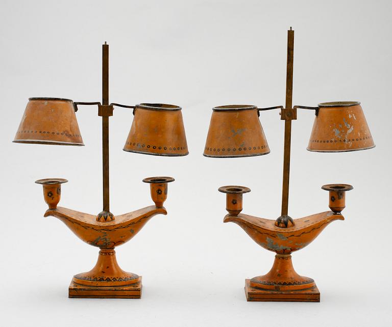 A pair of tole lamps, first half 19th century.