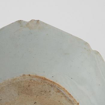 Two Chinese porcelain chargers and a sauceboat, Qing dynasty, Qianlong (1736-95).