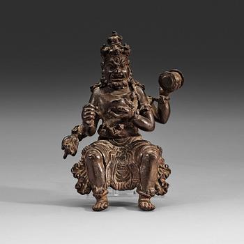 367. A seated bronze figurine of Mahakala, 15/16th century or earlier.