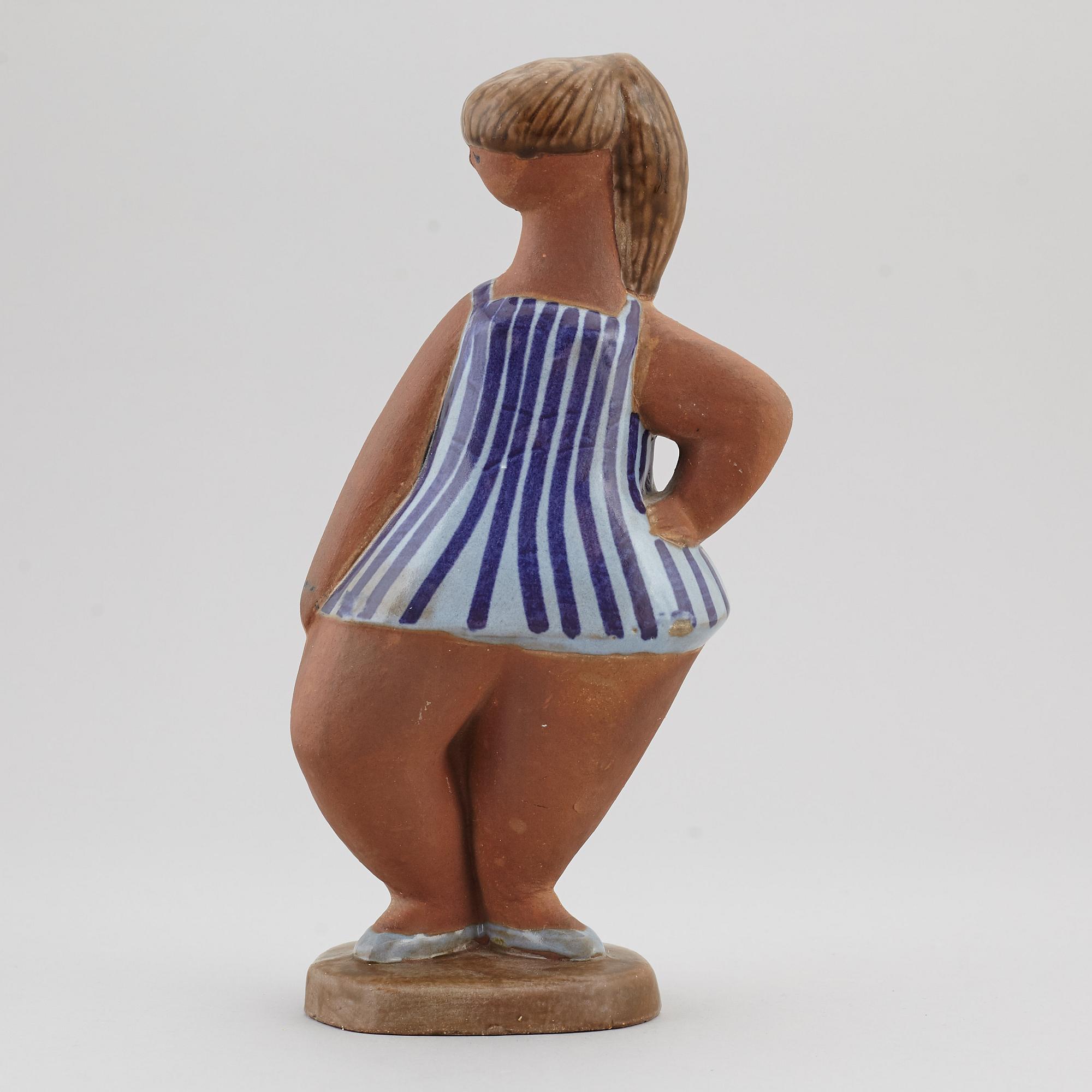 LISA LARSON, a 'Dora' stoneware figurine, from ABC-Flickorna, Gustavsberg.