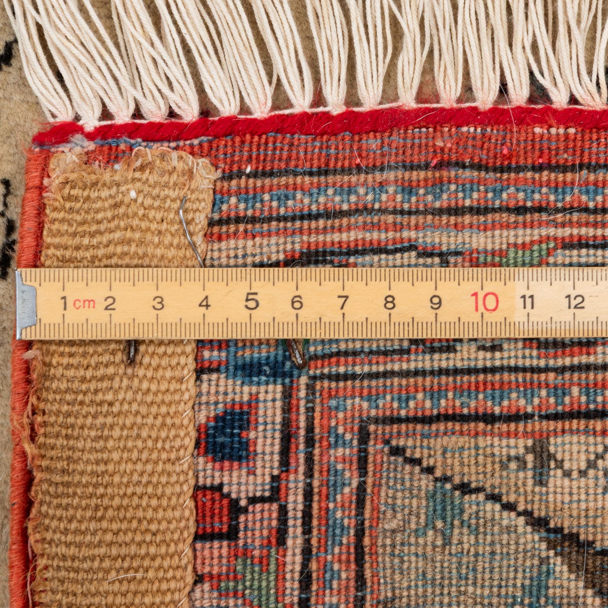 Carpet, figural. approx. 200 x 140 cm.