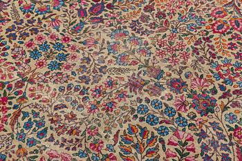 An antique 'Millefleur' Kerman Laver carpet, ca 434 x 321 cm.