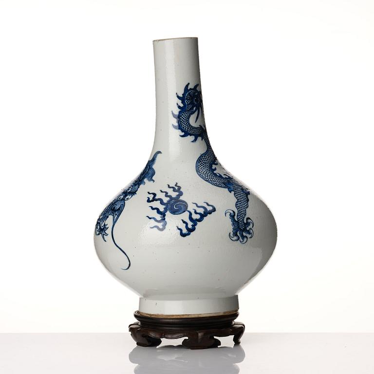 A blue and white dragon vase, Qing dynasty with Xuande six character mark.