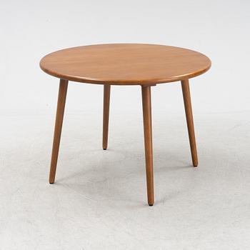 Jonas Lindvall, a stained oak dining table for Stolab.