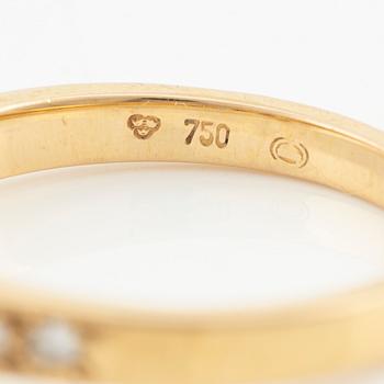 Ring in 18K gold with round brilliant-cut diamonds.