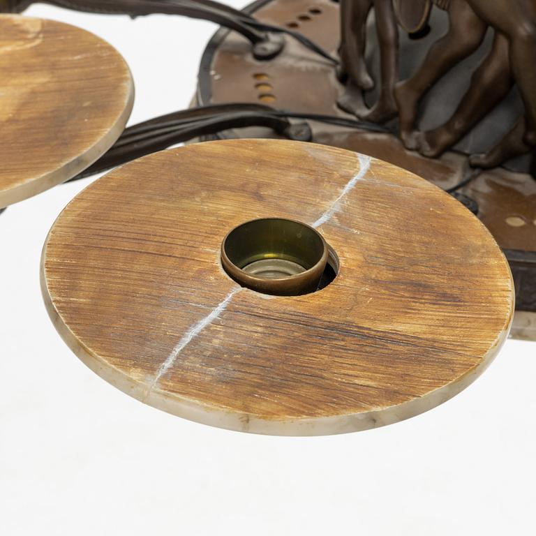 An Art Nouveau Bronze Ceiling Light, early 20th century.