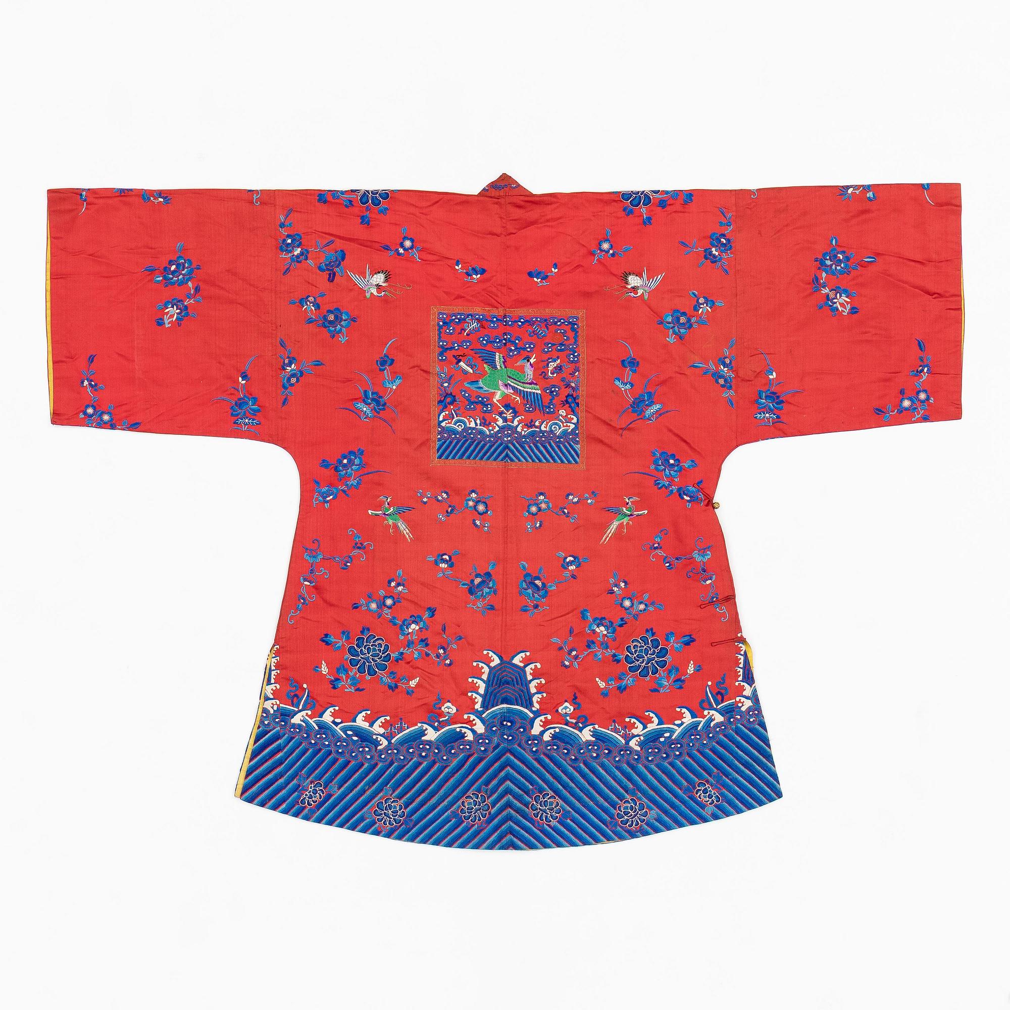 A Chinese semi-formal embroidered silk robe, late Qing dynasty, circa 1900.