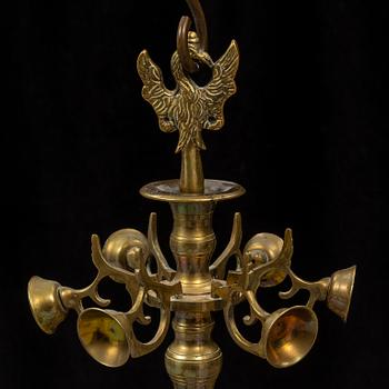 A brass baroque style chandelier, 19th century.