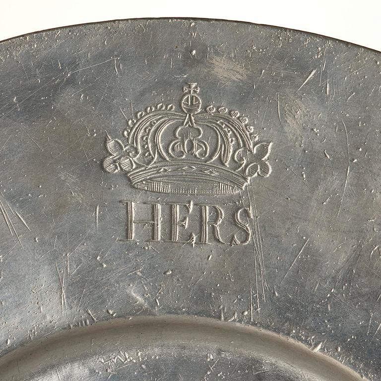 A pewter plate from Hedvig Eleonora's 'Wadstena' service, dated 1670.