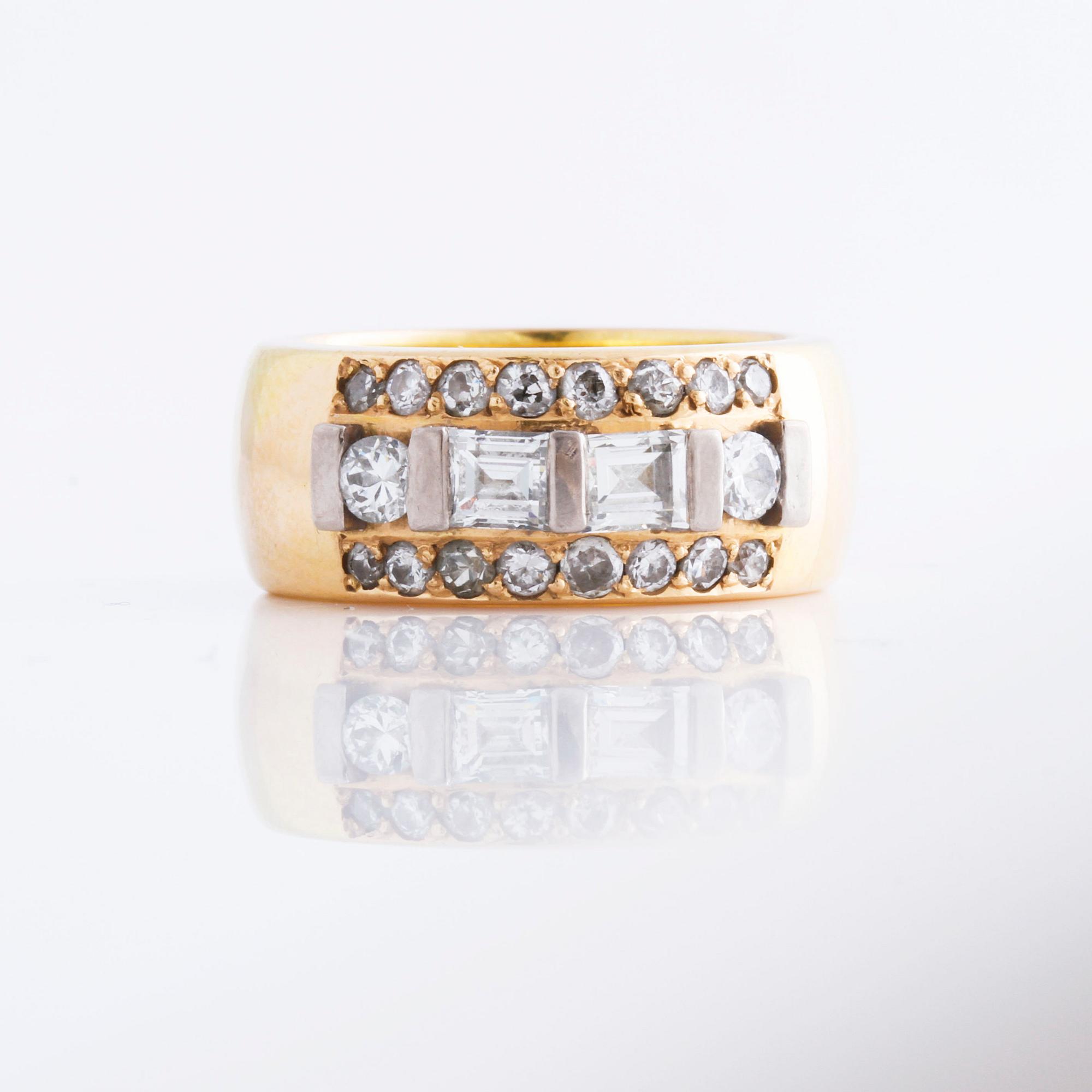 A ca 0.60 - 0.70 cts brilliant and baguette cut diamond ring by Bror Schalin, Östersund.