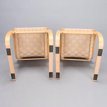 ALVAR AALTO, Pair of model '406' armchairs for Artek, late 20th century .