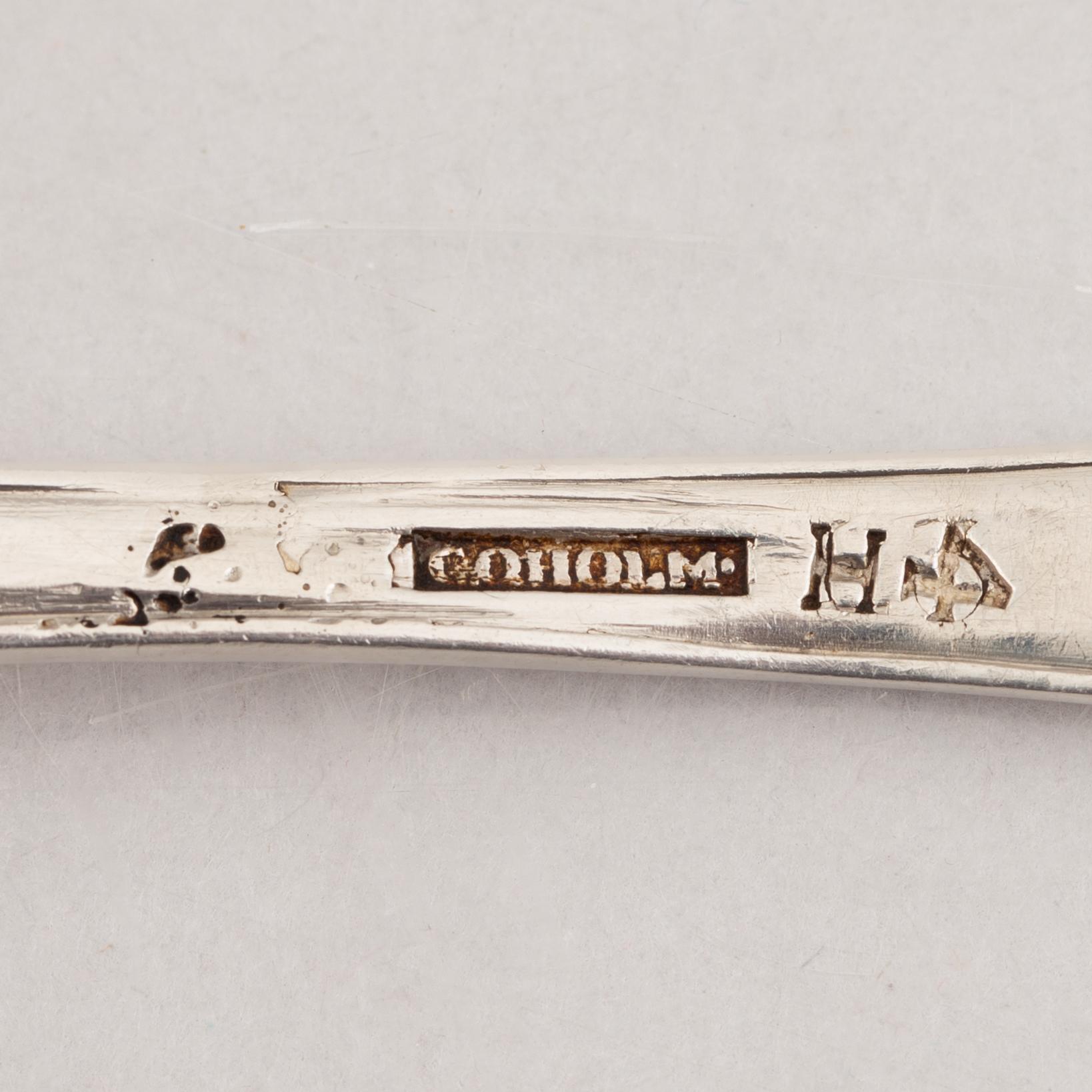 Nine Swedish Silver Table Spoons and a Sauce Ladle, 19th Century.