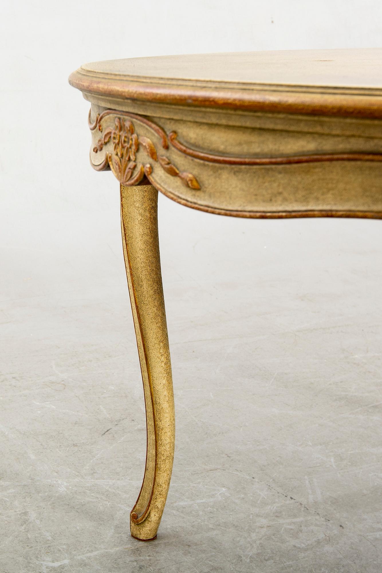 A mid 20th century Louis XV-style table from Paoletti, Firenze Italy.