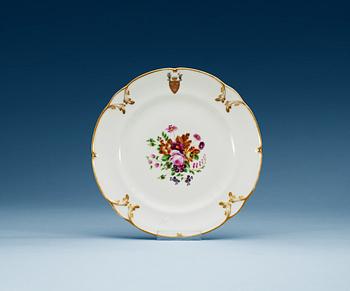 1246. A Russian armorial Popov dinner plate, 19th Century.