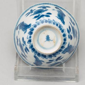 A set of four matched blue and white cups and saucers, Qing dynasty Kangxi (1662-1722).