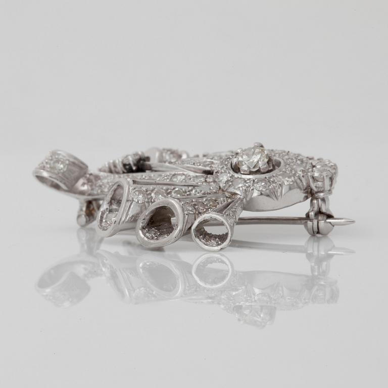 BROSCH med åttkants- samt briljantslipade diamanter totalt ca 3.20 ct.