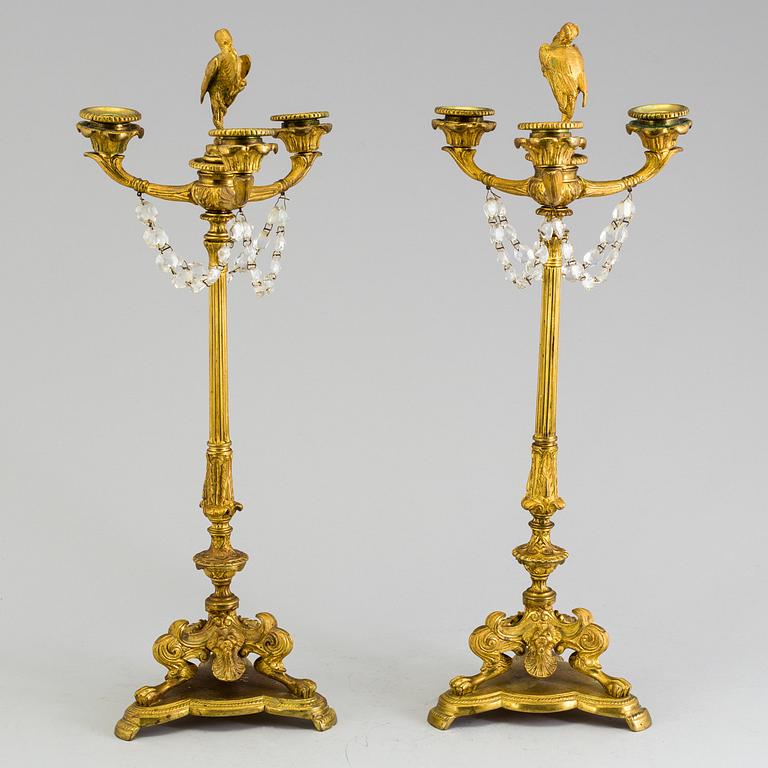 A pair of neorenaissance candelabras, about 1900.