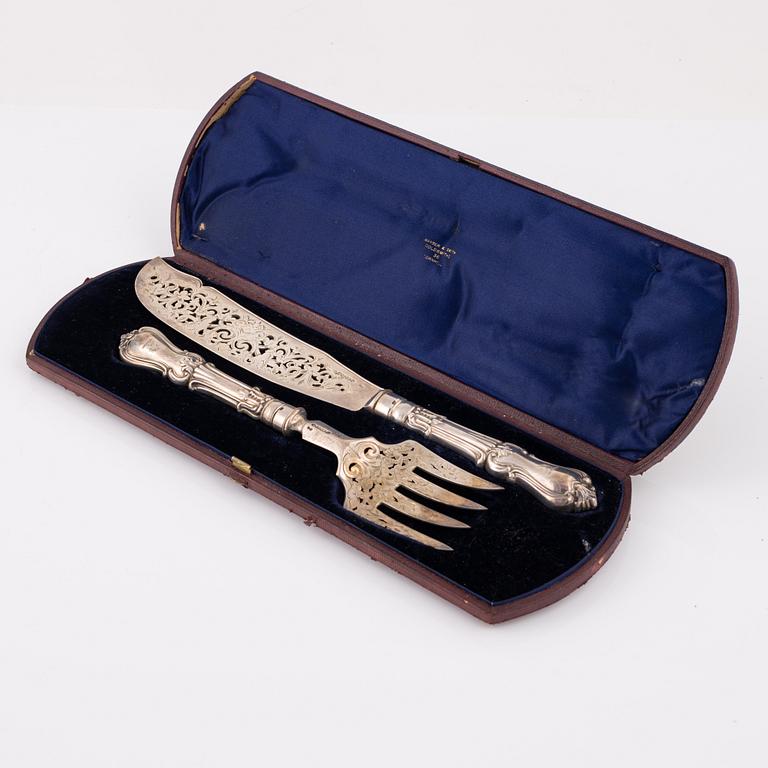 A silver cutlery set by George W Adams London 1861.