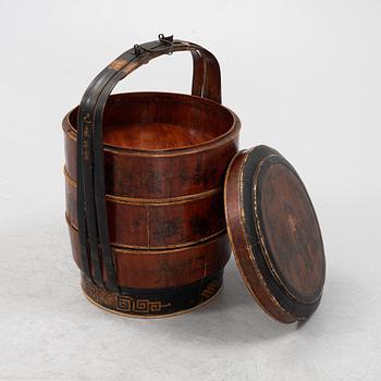 A three tiered food basket, China, early 20th century.