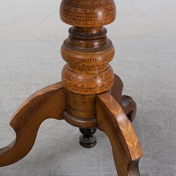 A 20th Century center table.
